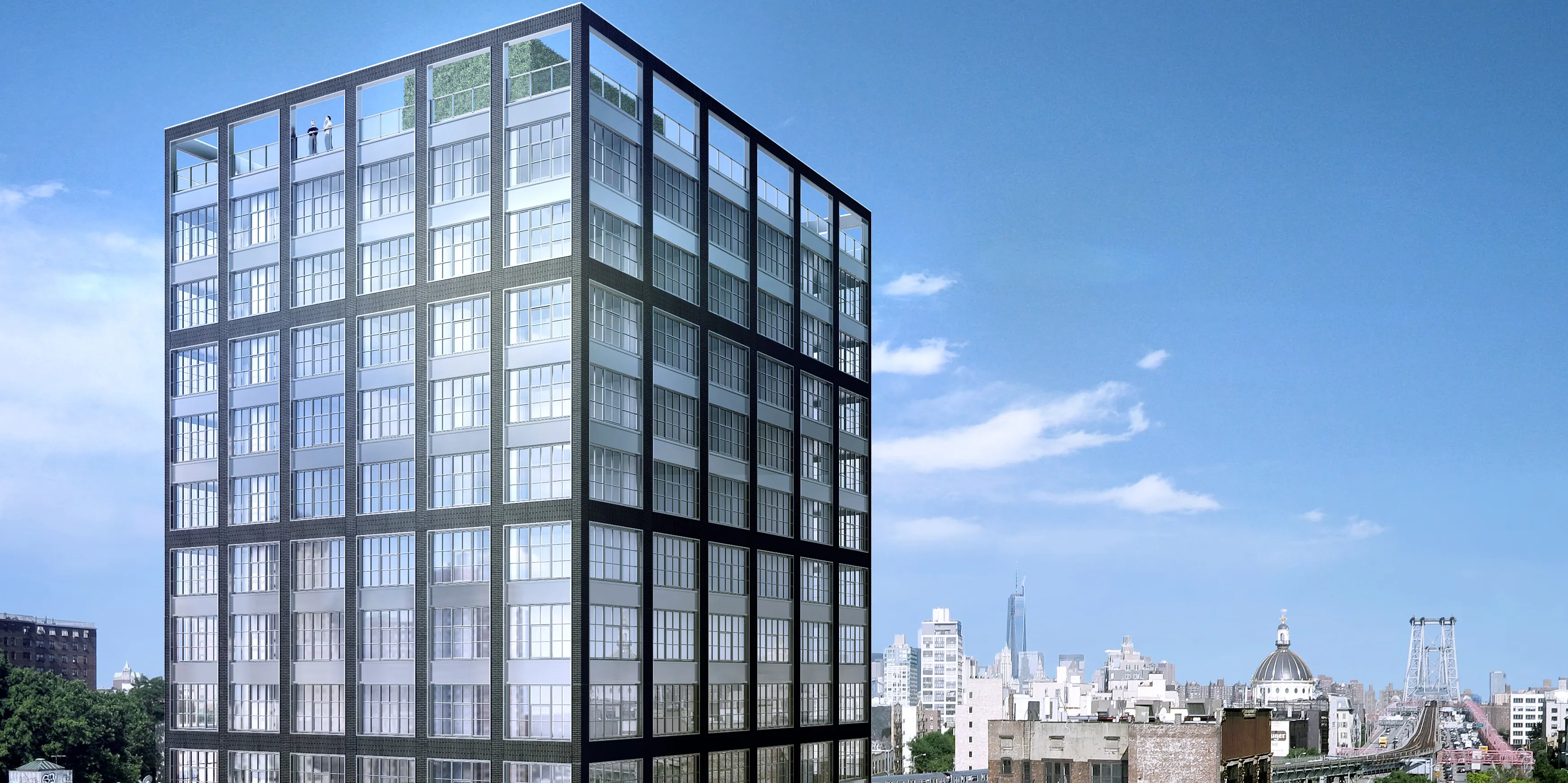 A modern glass and steel high-rise building with a rooftop terrace stands against a bright blue sky, overlooking a cityscape with various buildings and distant skyscrapers.